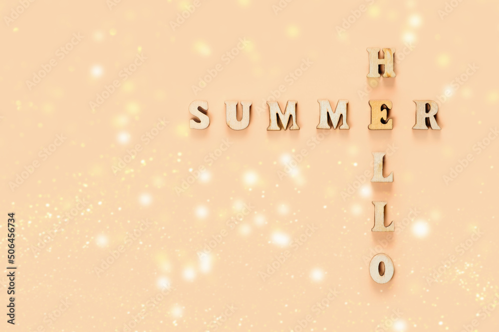 Hello Summer - text from letters on an orange background. Greeting summer and warmth. New season.