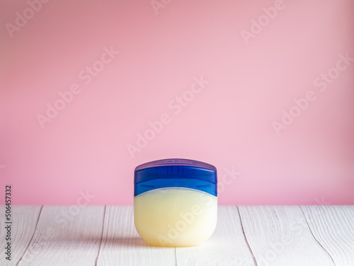 Big container of cream vaseline with copy space for text