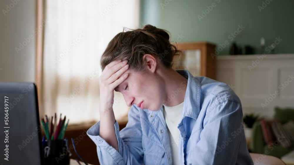 young upset woman with wet eyes looks on laptop screen, feels disappointed and tired caused failure. breathes out, puts on eyeglasses and tries again, starts typing on keyboard resolution. young upset woman with wet eyes looks on laptop screen, feels disappointed and tired caused failure. breathes out, puts on eyeglasses and tries again, starts typing on keyboard resolution.