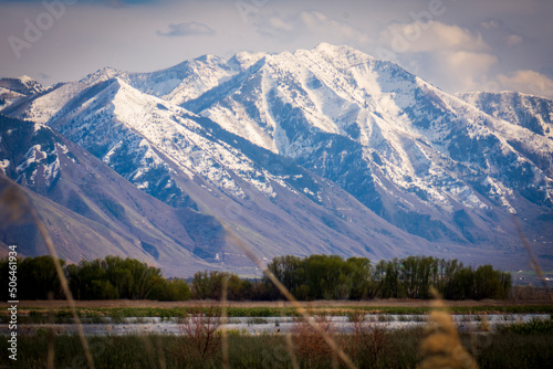 Snowy Wasatch Mountains beyond Utah Lake photo