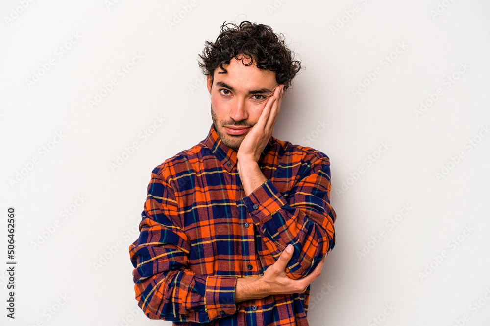 Young caucasian man isolated on white background who is bored, fatigued and need a relax day. Young caucasian man isolated on white background who is bored, fatigued and need a relax day.
