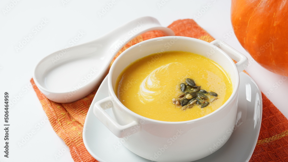 Creamy pumpkin soup with bacon. Healthy organic pumpkin cream soup Creamy pumpkin soup with bacon. Healthy organic pumpkin cream soup