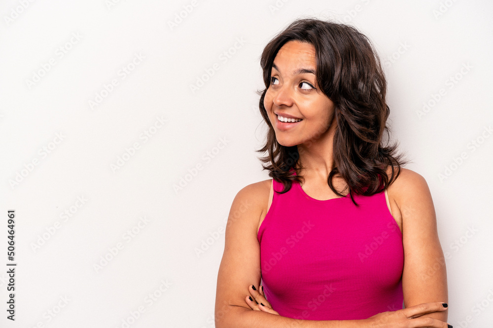 Young hispanic woman isolated on white background smiling confident with crossed arms. Young hispanic woman isolated on white background smiling confident with crossed arms.