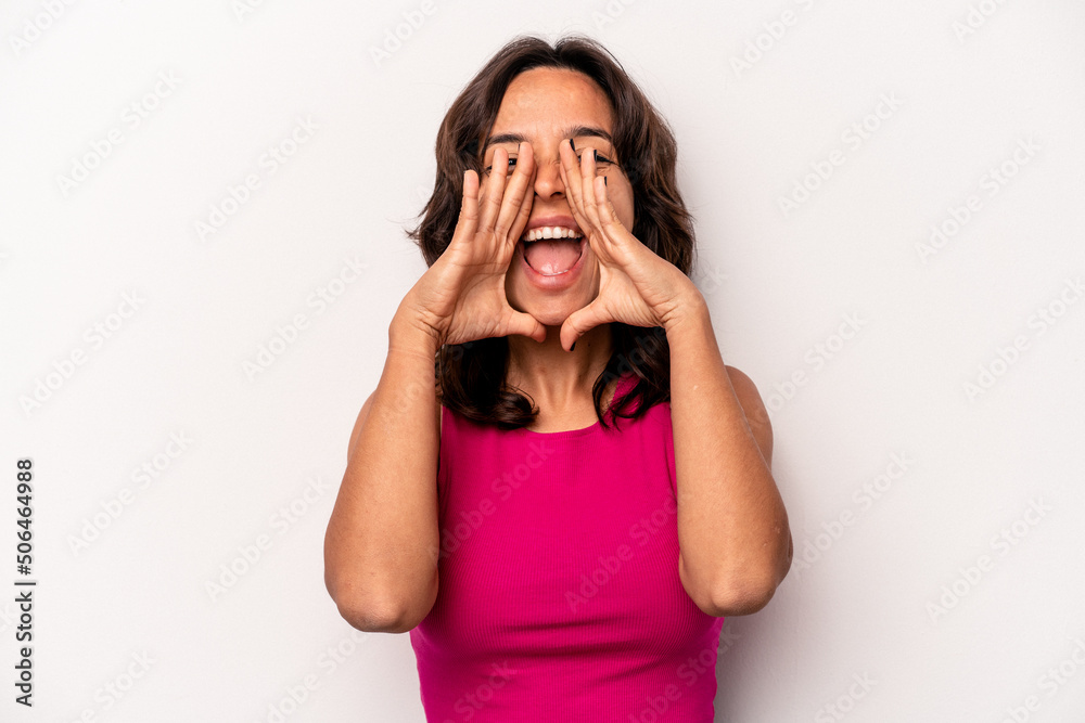Young hispanic woman isolated on white background shouting excited to front. Young hispanic woman isolated on white background shouting excited to front.