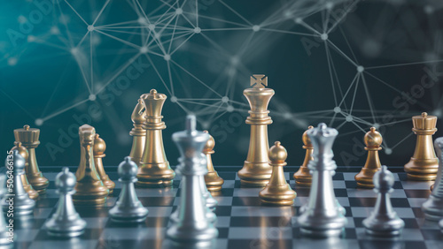 Hand of businessman holding gold king chess on stock market or forex trading graph chart with cityscape image economy trend for digital financial investment.Management or leadership strategy concept.