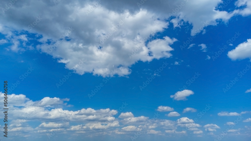 Cirrus clouds in a bright blue summer sky. White light clouds in a clear sky. Shooting from a drone. Shooting with a quadcopter Cirrus clouds in a bright blue summer sky. White light clouds in a clear sky. Shooting from a drone. Shooting with a quadcopter