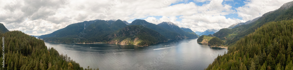 Panoramic Aerial View of Indian Arm, Mountains and Canadian Nature Landscape. Deep Cove, Vancouver, British Columbia, Canada. Panorama Background Panoramic Aerial View of Indian Arm, Mountains and Canadian Nature Landscape. Deep Cove, Vancouver, British Columbia, Canada. Panorama Background