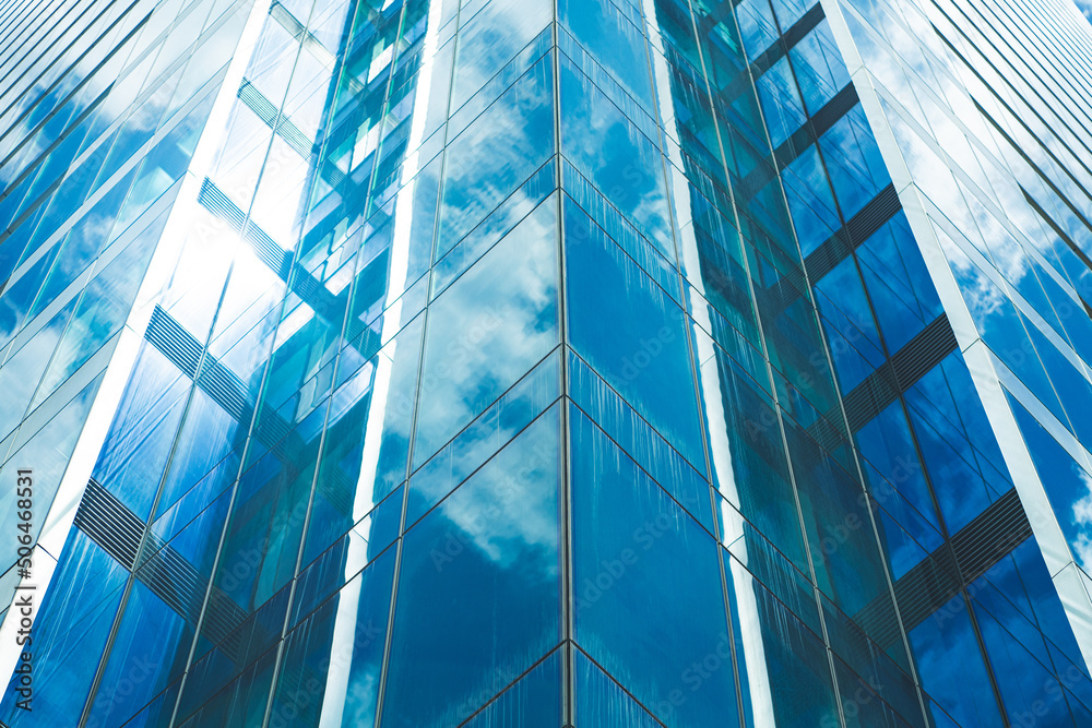Obraz premium underside panoramic and perspective view to steel blue glass high rise building skyscrapers