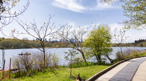 Scenic View of a Path in a vibrant city park by the lake. Spring Season. Deer Lake, Burnaby, Vancouver, British Columbia, Canada.