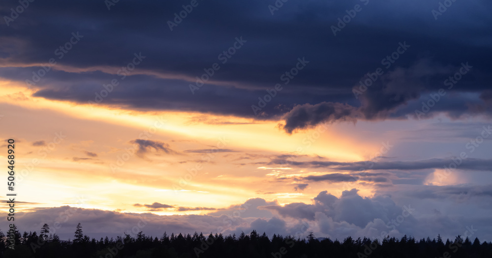 Fototapeta premium View of Cloudscape during a colorful sunset or sunrise. Taken on the West Coast of British Columbia, Canada. Nature Background