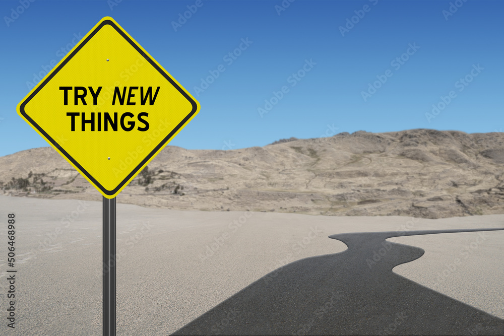 Try New Things text on road sign.