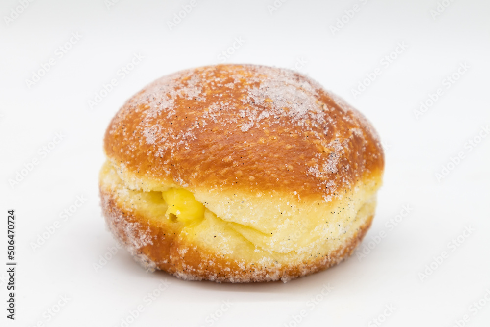 Stuffed Key Lime Filling Donut on a White Background Stuffed Key Lime Filling Donut on a White Background