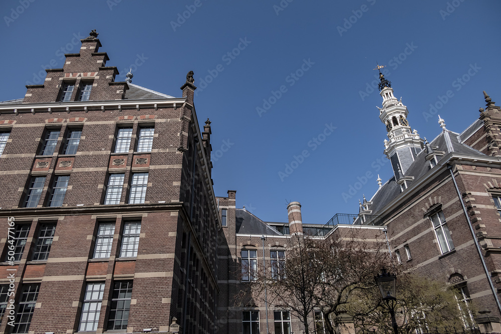Architectural fragments of old Amsterdam building: XIX century Neo-Renaissance-style building, former Town Hall and Archive of Amstel Community Amsterdam, The Netherlands. Architectural fragments of old Amsterdam building: XIX century Neo-Renaissance-style building, former Town Hall and Archive of Amstel Community Amsterdam, The Netherlands.