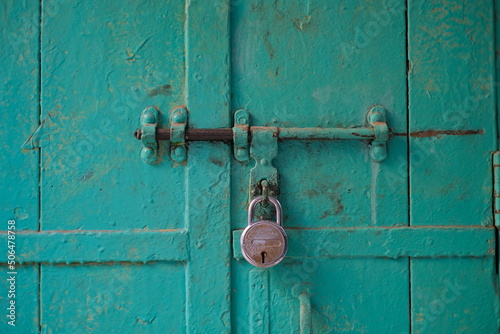 Old padlock on an old door in delhi India