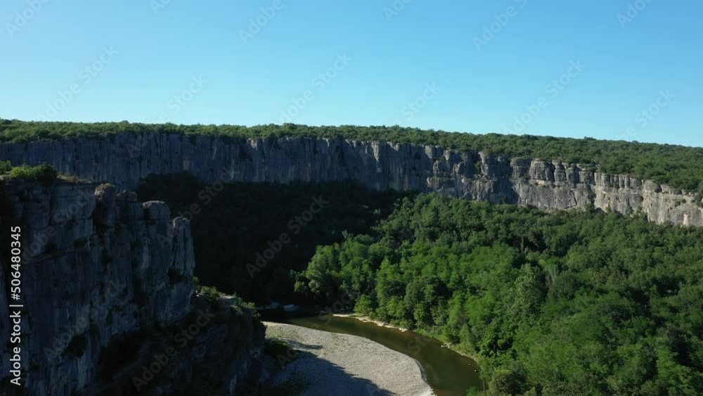 The river in the middle of the Gorges de lArdeche in Europe, France, in summer on a sunny day. The river in the middle of the Gorges de lArdeche in Europe, France, in summer on a sunny day.