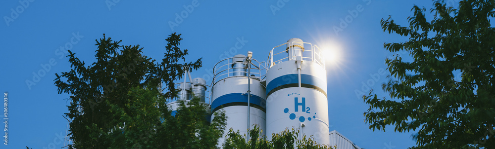Hydrogen renewable energy production - hydrogen gas for clean electricity solar and windturbine facility.