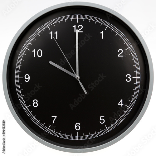 Wall clock showing ten o'clock isolated on white background