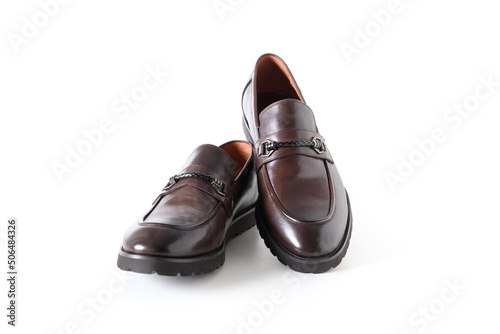 Classic modern male brown leather shoes isolated on white background.
