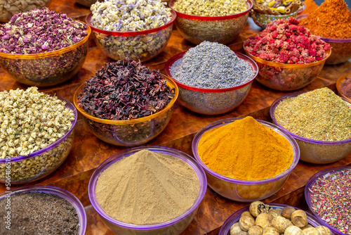 Variety of Arabic spices and herbs in the traditional spice market in Dubai. Food ingredients.