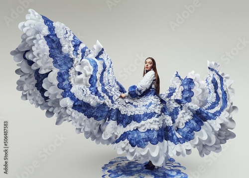 Φωτογραφία Woman in flying long wonderful dress with blue and white waves