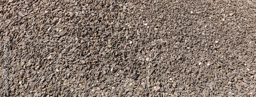 Full frame Texture of Gravel, broken basalt stones, Split, Coarse aggregate, stone abstract pattern background. Background for construction. limestone materials for construction industry.