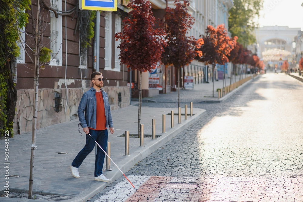 Blind Man Walking On Sidewalk Holding Stick Blind Man Walking On Sidewalk Holding Stick
