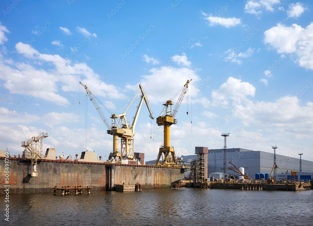 Shipyard in Szczecin seen from the water, Poland.