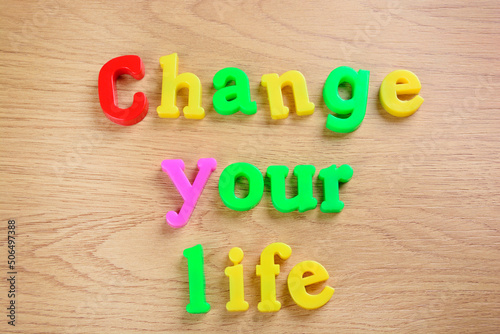 Change your life words on a table