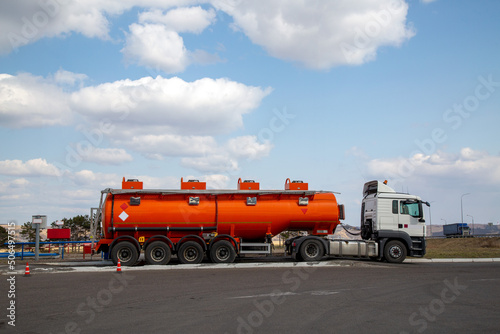 Tanker with gasoline at a gas station. Fuel for cars, transport.