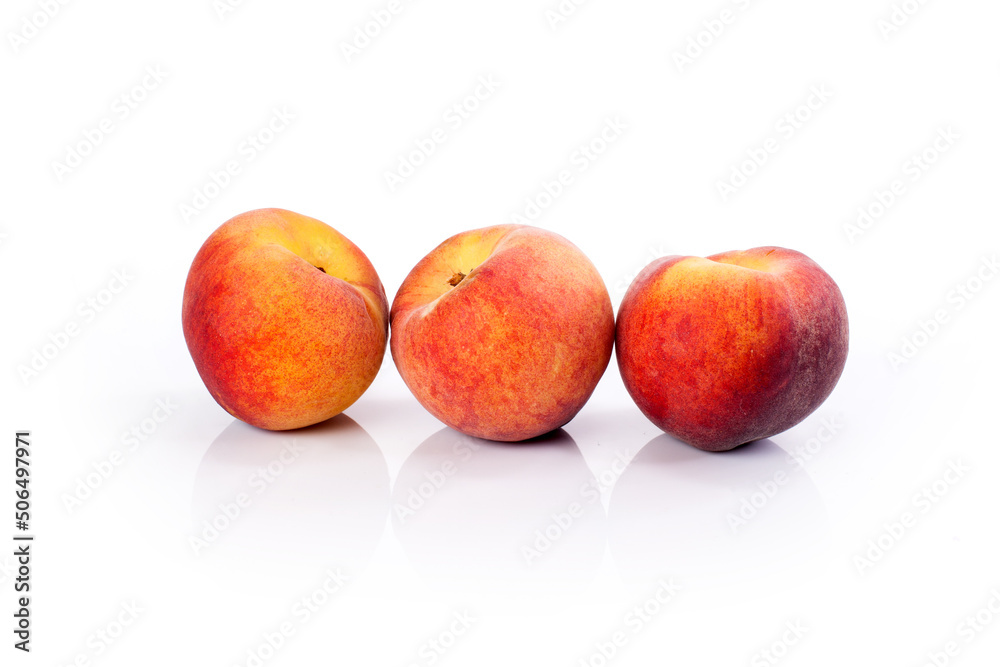 Fresh peaches isolated on a white background Fresh peaches isolated on a white background