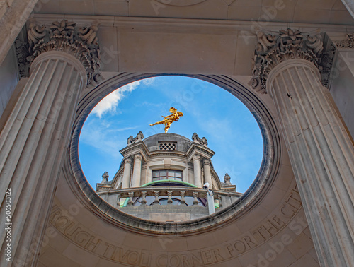 The gilded bronze figure of Ariel on top of the Bank of England photo