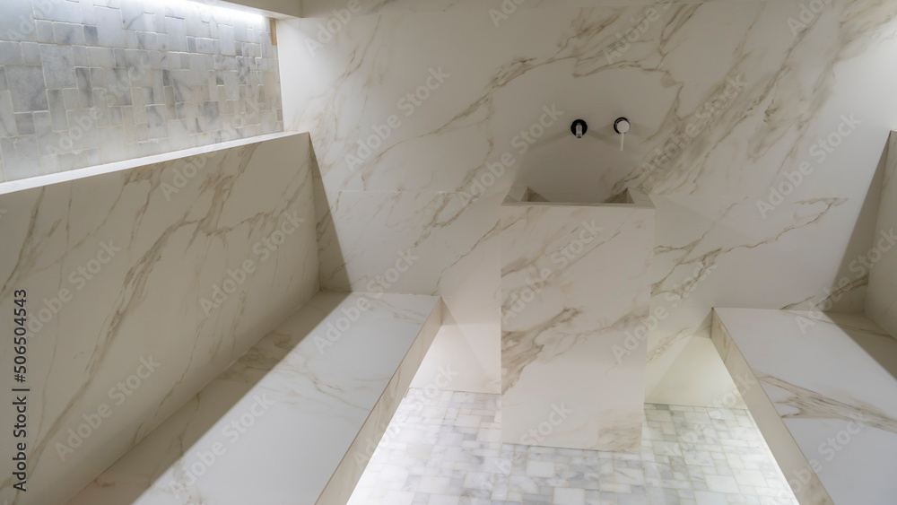 Classic turkish hammam. White turkish bath with marble surfaces. Marble oriental bathroom. Steam bath interior. - obrazy, fototapety, plakaty 