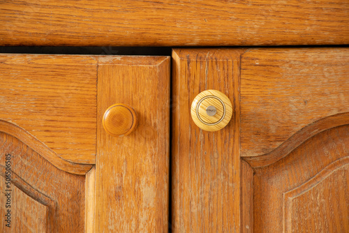Old kitchen wooden brown cabinet as background ,kitchen furniture