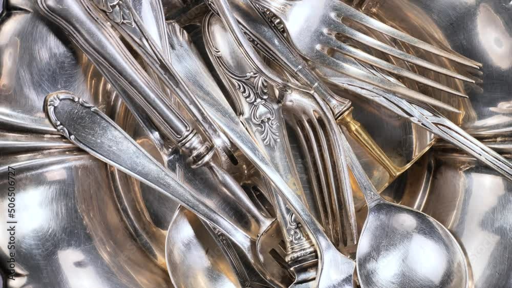 Old kitchen silverware on a bright, colored background Old kitchen silverware on a bright, colored background