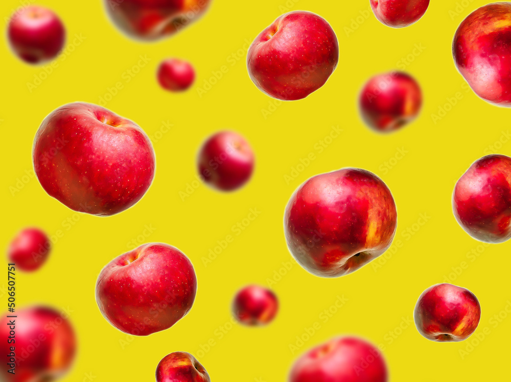 Flying levitating floating red ripe fresh juicy apples in air on yellow background. Levity summer fruits. Trendy, minimal,creative food.healthy nutrition Flying levitating floating red ripe fresh juicy apples in air on yellow background. Levity summer fruits. Trendy, minimal,creative food.healthy nutrition