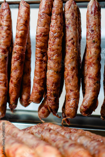 chorizo sausages in a local shop. vertical photo