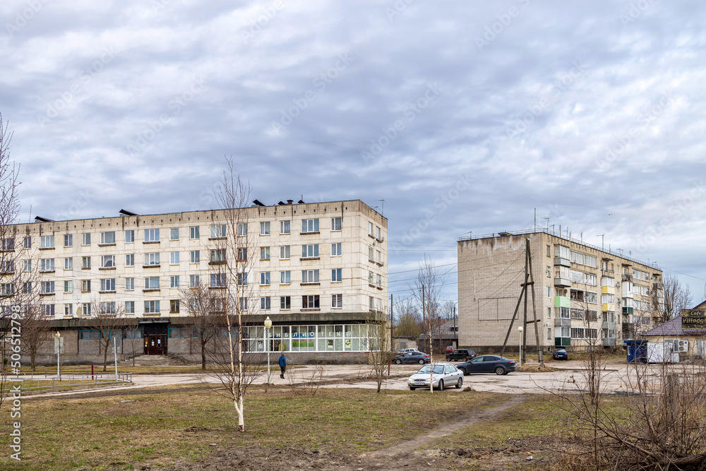 OLONETS, Karelia RUSSIA - May 09, 2022: View of the five-story block houses of the Khrushchev period. Central library of the city. OLONETS, Karelia RUSSIA - May 09, 2022: View of the five-story block houses of the Khrushchev period. Central library of the city.