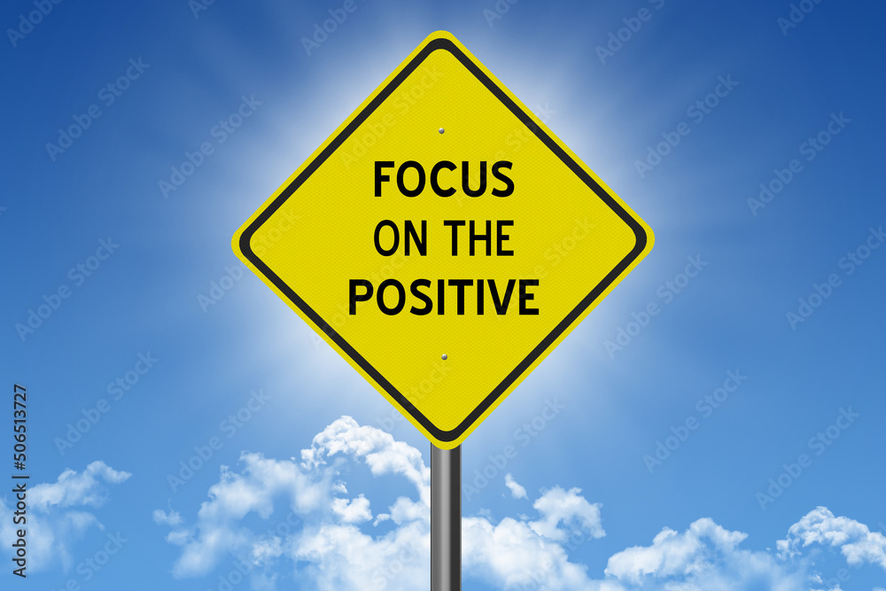 sign on blue sky background with sun and clouds and inspirational text sign on blue sky background with sun and clouds and inspirational text