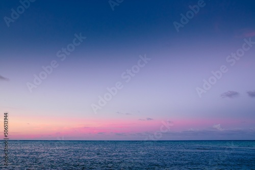 Calm purple sunset on the ocean © Juliya Vitsenko