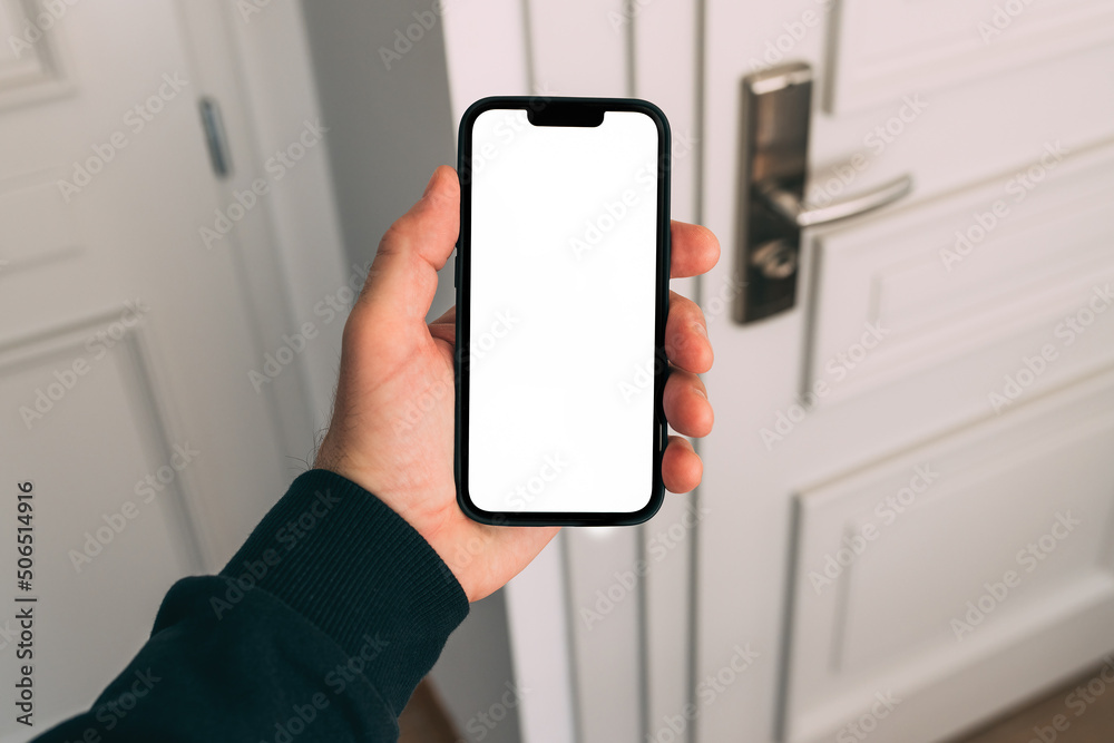 Smartphone mockup, internet of things and smart home concept, man using mobile phone Smartphone mockup, internet of things and smart home concept, man using mobile phone