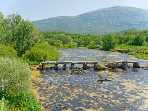 View of the old footbridge on the river Cetina