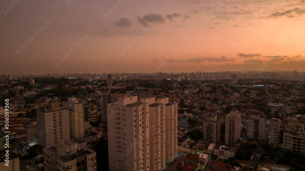 Beautiful sky with clouds in a sunset in São Paulo, Brazil. In the Planalto Paulista neighborhood. with residential buildings in the background