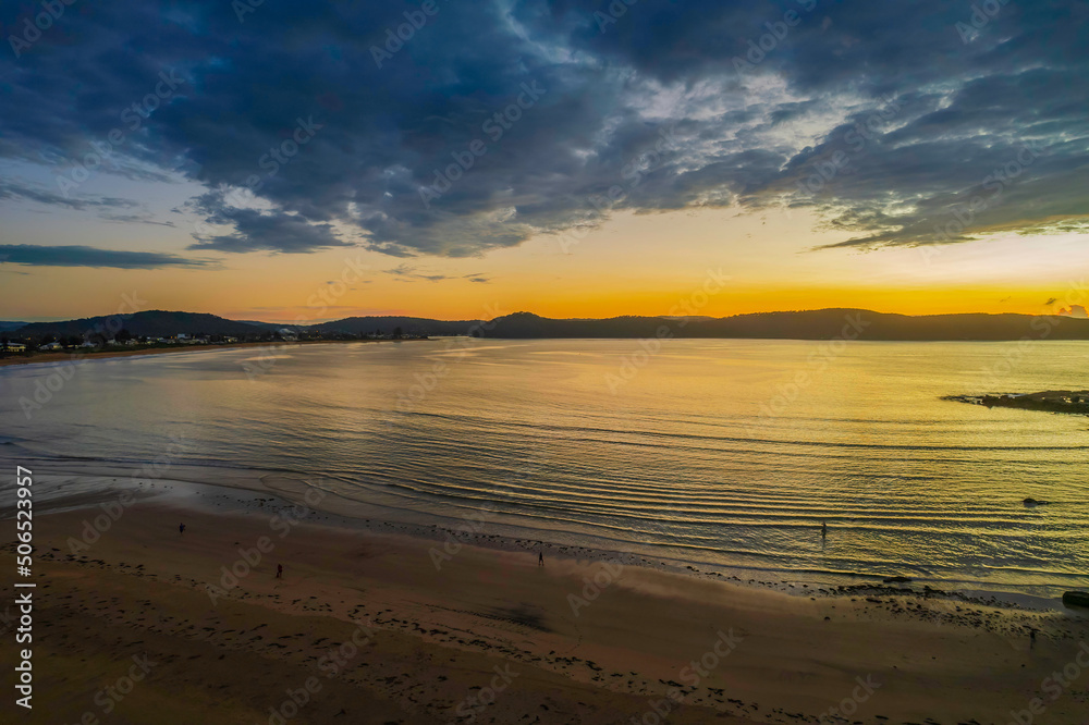 Obraz premium Aerial sunrise seascape with low clouds