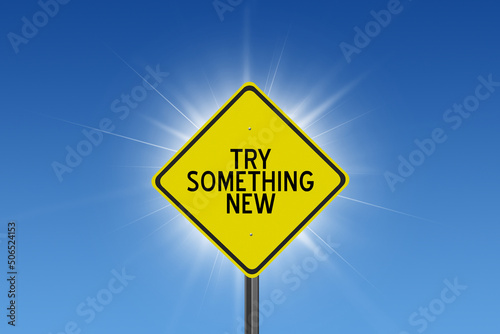 sign on blue sky background with sun and clouds and inspirational text