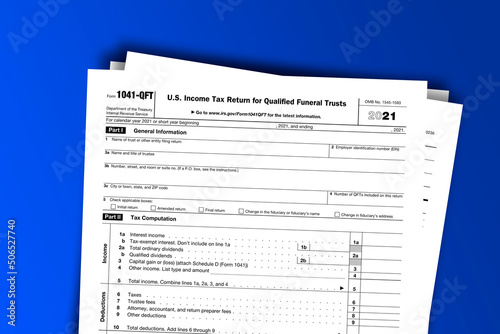 Form 1041-QFT documentation published IRS USA 44207. American tax document on colored