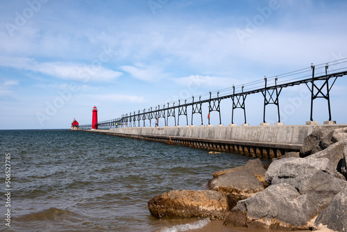 Landscape of the Grand Haven Lighthouse, pier, and catwalk at morning, Lake Michigan, Michigan, USA photo