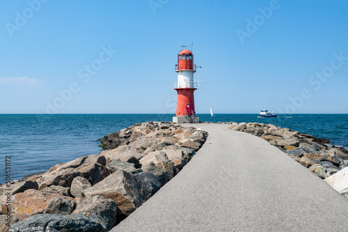 Lighthouse Ostmole Warnemünde near the Baltic Sea, Rostock, Mecklenburg-Vorpommern, Germany