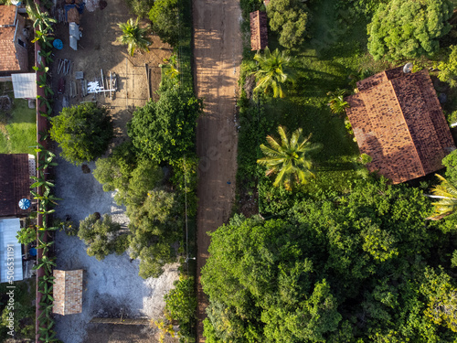 Small village in the middle of nature, Mata Atlantica, Bahia, Brazil - aerial drone view