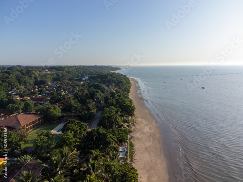 Charming seaside town with the look of a fishing village in the middle of the Atlantic Forest - Cumuruxatiba, Bahia, Brazil - aerial drone view of the beach