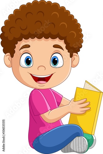 Happy boy sitting with reading a book